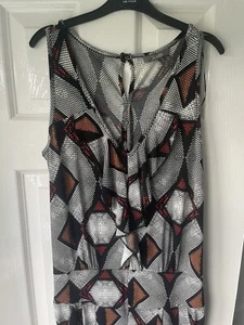 South abstract black orange and red jumpsuit in size 10. - Picture 1 of 5