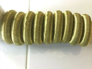 Set aus 9 Serviettenringen schimmernd goldfarben mit Garn umwickelt Urlaub Partys - Bild 1 von 4