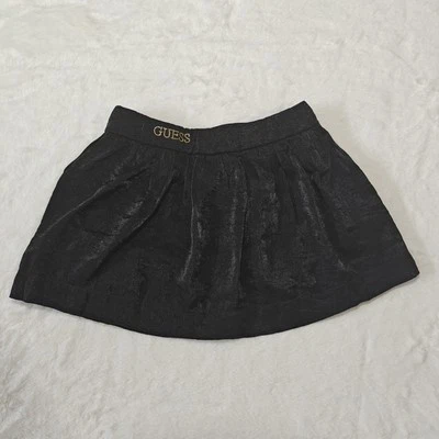 Guess Size 6 Girls Kids Black Gold Shiny Metallic Logo Pleated Lined Mini Skirt - Image 1 of 4