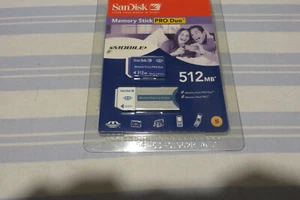 SANDISK MEMORY STICK PRO DUO - 512 MB SEALED NEW - WITH ADAPTOR - Picture 1 of 3