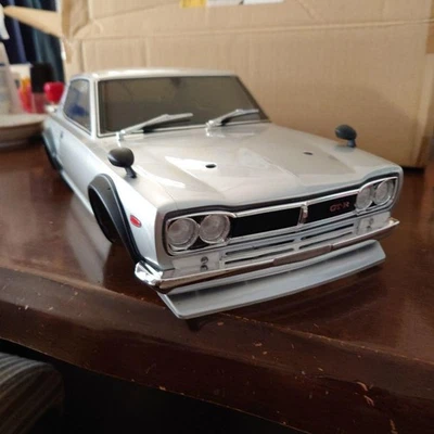 Carrozzeria auto Kyosho 1/10 Hakosuka GT-R RC argento con luci alogene solo... - Immagine 1 di 4