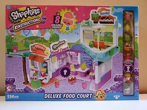 NIB Shopkins Kinstructions Deluxe Food Court w/ 8 buildable figures 334 pcs New - Picture 1 of 2