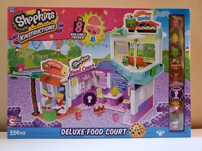 Nuevo en caja Shopkins Kinstructions Deluxe patio de comidas con 8 figuras construibles 334 piezas Nuevo Foto 1 de 2