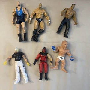 Lot Of 6 Wrestling Figures Jakks, The Rock, Rey mysterio , etc + MMA fig - Foto 1 di 6