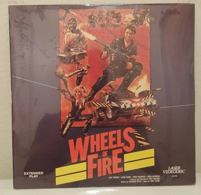 WHEELS OF FIRE - 1986 MAD MAX ROAD WARRIOR CLONE - RARE LASERDISC OZPLOITATION  - Image 1 of 2