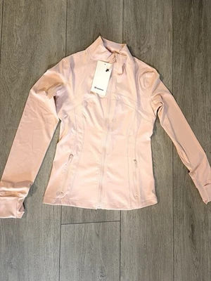 Chaqueta Lululemon Define - Talla 8 Rosa Claro Foto 1 de 4