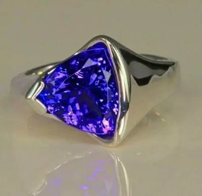 Anillo de boda para hombre de tanzanita azul simulado de 3 billones de quilates enchapado en oro blanco de 14 quilates Foto 1 de 4