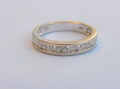 IMPRESIONANTE ANILLO DE MEDIA ETERNIDAD DIAMANTE 0,50 QUILATES ORO BLANCO 14 QUILATES KRN TALLA N 1/2 - 3,4 g Foto 1 de 4