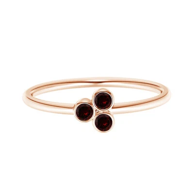 Conjunto de bisel de tres piedras 4 mm redondo granate apilable anillo para mujer oro rosa 14 k Foto 1 de 4