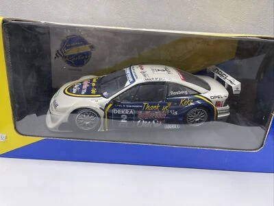 UT MODELS 180954282 OPEL CALIBRA V6 TEAM ROSBERG WHITE VERSION 1:18 UNOPENED - Image 1 of 4