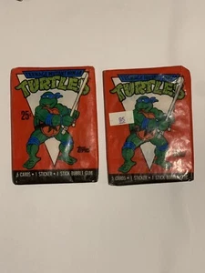Vintage Menge 2 1989 Teenage Mutant Ninja Turtles KARTENAUFKLEBER BUBBLE GUM WAX PACK - Bild 1 von 4