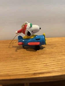 PEANUTS Snoopy en un avión Whitman’s PVC colgante adorno de Navidad figura - Imagen 1 de 7