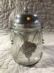 Tarro de galletas de vidrio transparente vintage bote con tapa musical superpuesta de metal - Imagen 1 de 4