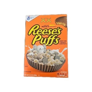 KAWS REESE'S PUFFS 11,5 OZ SCATOLA CEREALI General Mills edizione limitata nuovo mai aperto - Foto 1 di 2
