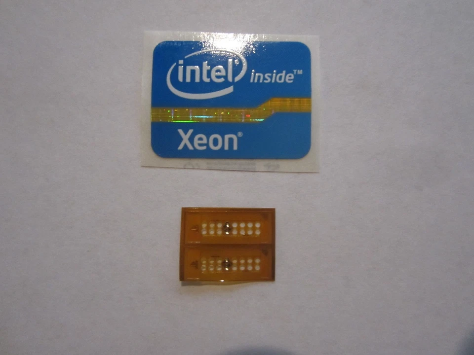 2 LGA 771 to 775 Adapters for Xeon Mod with one 'Intel Xeon Inside' sticker - Image 1 of 1