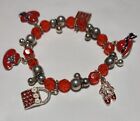 Bracelet costume mode charme extensible ton rouge et argent Red Hat Society