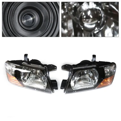 Juego faros delanteros izquierdo derecho aptos para Mitsubishi Pajero Montero 2000-2006 Foto 1 de 4