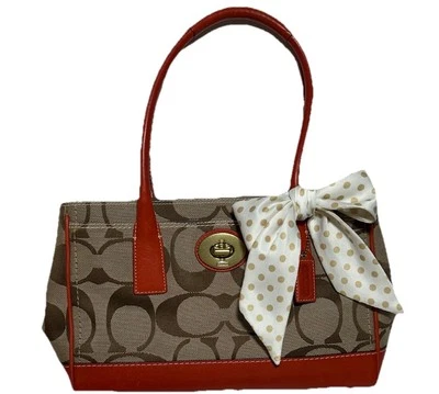 COACH~MADELINE~*Vintage/Rare*  Burnt Orange Leather, Mini “C” Canvas Bow-Handbag - Image 1 of 4