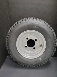 4.80 x 4.00 x 8 (4 HOLE PATTERN) TURF TREAD TIRE WITH RIM - Picture 1 of 3