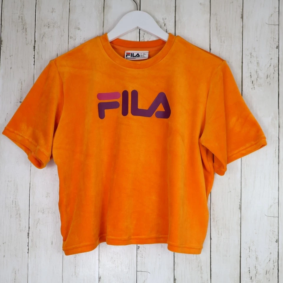 Camiseta corta de terciopelo naranja de manga corta Fila para mujer talla pequeña deportiva informal Foto 1 de 1