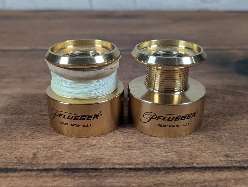 lot of 2 Pflueger Trion 4730 Spool Gear ratio 5.2:1 - Image 1 of 4