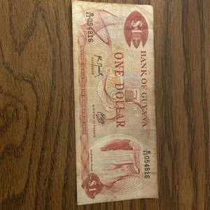 Billete de un dólar del Banco de Guyana - Imagen 1 de 12