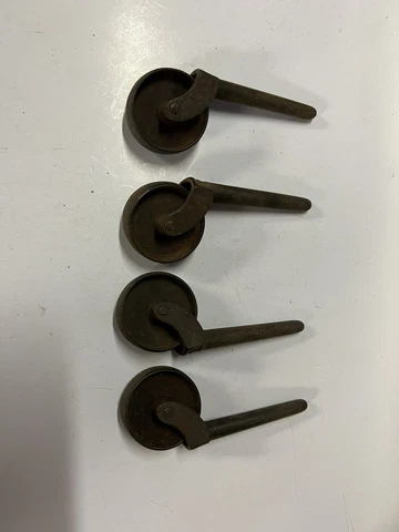 Lot Of 4 Antique ￼old vtg Furniture Caster Roll Cast Iron Metal Wheels Rolling Cover