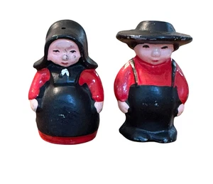 Salero y pimentero vintage de hierro fundido Amish pareja rojo y negro 2 pulgadas - Imagen 1 de 6