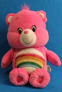 2015 Care Bear ""Cheer Bear"" habla, canta y se mueve rosa arco iris felpa vientre ¡LINDO! - Imagen 1 de 7