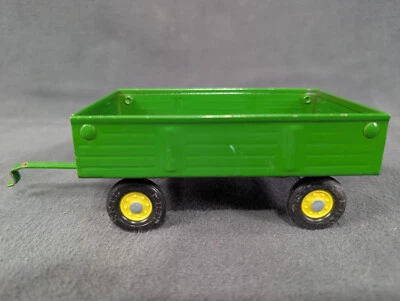 Vagón agrícola verde ERTL vintage años 70-80 74-7650 con puerta trasera de acero prensado Foto 1 de 4