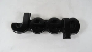 19-23 Jeep Cherokee Emblem Rear Liftgate Black Badge Symbol Logo Genuine OEM - Picture 1 of 5