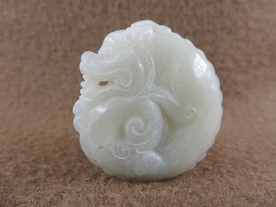 Antiguo colgante de jade dragón tallado a mano de jade hetiano natural de China Foto 1 de 4