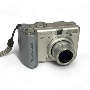 Canon Powershot A60 Digital Camera Silver 2.0 MP — for PARTS or REPAIR ONLY - Picture 1 of 9