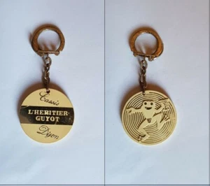 Schlüsselanhänger Cassis L’Héritier Guyot, Dijon, weiß gelb (pc) - Bild 1 von 1