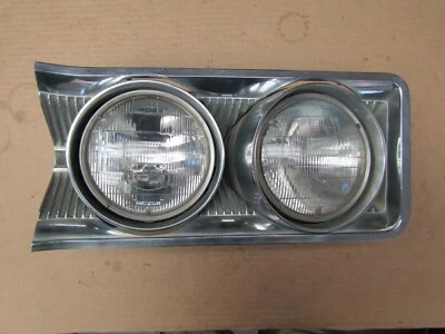 Conjunto completo de bisel de faro izquierdo Buick Wildcat 1964 Foto 1 de 4