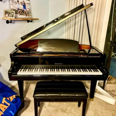 Elegant Wurlitzer Baby Grand Piano 4'8" Glossy Black Finish - Image 1 of 4