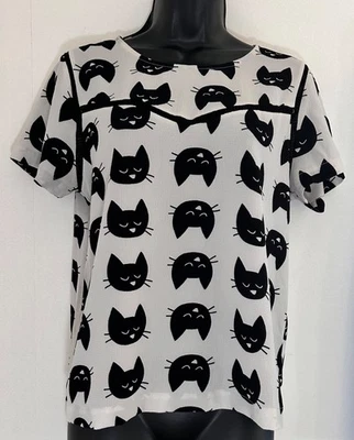 Talla M Lily White con caras de gato negras y detalles de ganchillo de Lily White. Excelente Foto 1 de 4