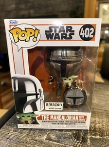 Funko Pop THE MANDALORIAN WITH GROGU AND PIN Amazon Exclusive Star Wars #402 - Bild 1 von 1