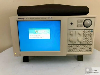 TLA 715 TEKTRONIX LOGIC ANALYZER MAINFRAME WITH TLA 7AA4 & SW DISKS SER# B030896 - Image 1 of 4