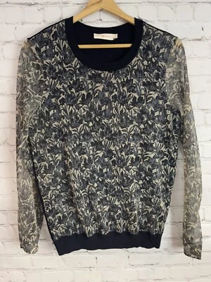 Suéter Tory Burch metálico e preto com mangas transparentes médio - Imagem 1 de 4