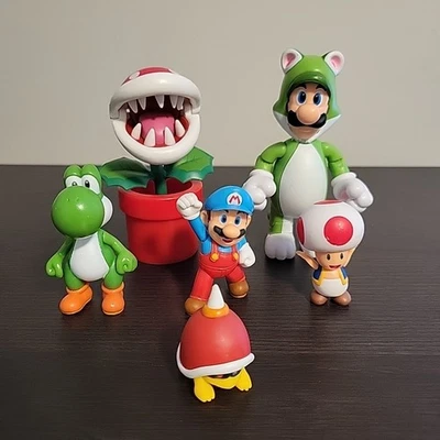 Lot Of 6 Super Mario Bros Figures - Mario, Yoshi, Piranha Plant, Toad, Cat Luigi - Image 1 of 4
