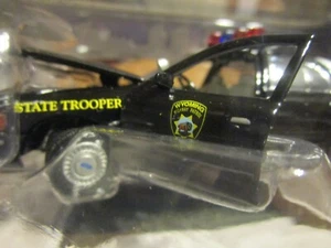 1:43 GearBOX Wyoming POLICE Car Ford 1/2500 - Picture 1 of 4