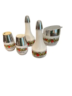 Juego de condimentos vintage de vidrio de leche Gemco tapas cromadas agitadores, aceite, vinagre y azúcar Foto 1 de 4