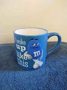 M&M's World Blue Character "I Woke Up Like This" Kaffeebecher 2023 Mars - Bild 1 von 8