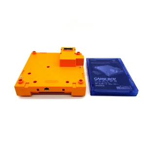 Nintendo GameCube Gameboy Player colore arancione e disco di avvio - spedizione gratuita veloce - Foto 1 di 7