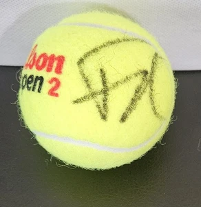 PELOTA DE TENIS ABIERTA FIRMADA POR FLAVIO COBOLLI CON CERTIFICADO DE AUTENTICIDAD. - Imagen 1 de 1
