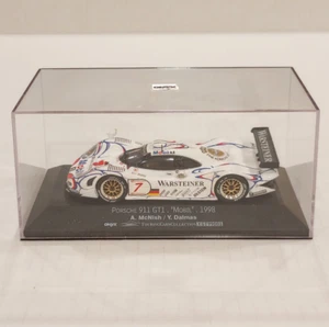 Coche de turismo Onyx 1:43 de colección. - Porsche 911 GT1 #7 "Mobil" A. McNish/Y. Dalma - Imagen 1 de 4