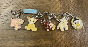 EUC WEBKINZ BETTELARMBAND 5 CHARMS ENTE EINHORN HUND AFFE SCHWEIN - Bild 1 von 5