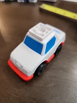 Винтажный полицейский автомобиль FISH PRICE GEOTRAX 1992 с откидной дорожкой Китай  - Изображение 1 из 4