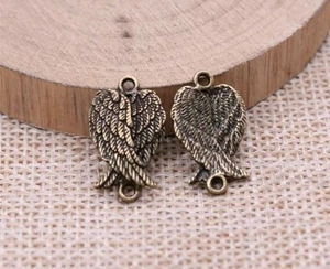 Lot de 5 breloques / Connecteurs ailes d'ange en métal Bronze, 1.9 x 1.1 Cm - Picture 1 of 1